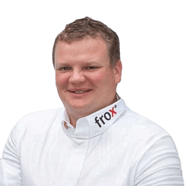Software developer from FROX GmbH, representing a development partner creating custom surveying applications integrated with Leica Geosystems instruments as part of the Partner Network ecosystem